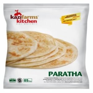 A 400g plastic pack of Kazi Farms Kitchen frozen Plain Paratha showing layered, golden-brown flatbreads with a "No Tasting Salt" label.