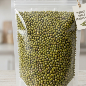 A clean vertical clear transparent stand up zipper pouch bag filled entirely with raw unpolished whole green mung beans moong dal.